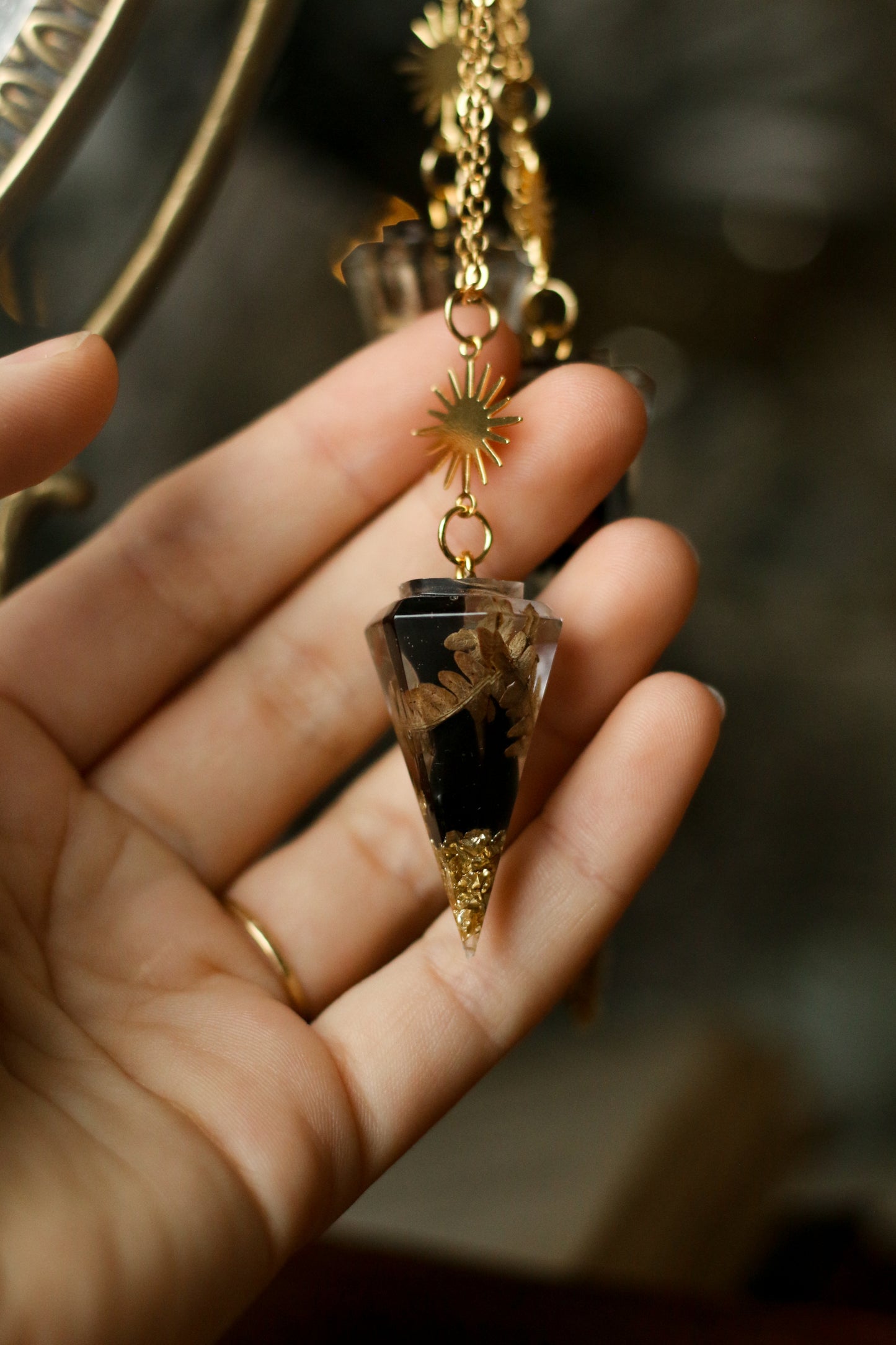 Pendule obsidienne et fougère