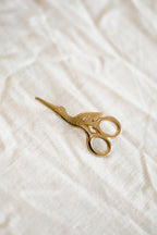 Golden stork scissors pin