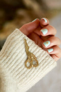 Golden stork scissors pin