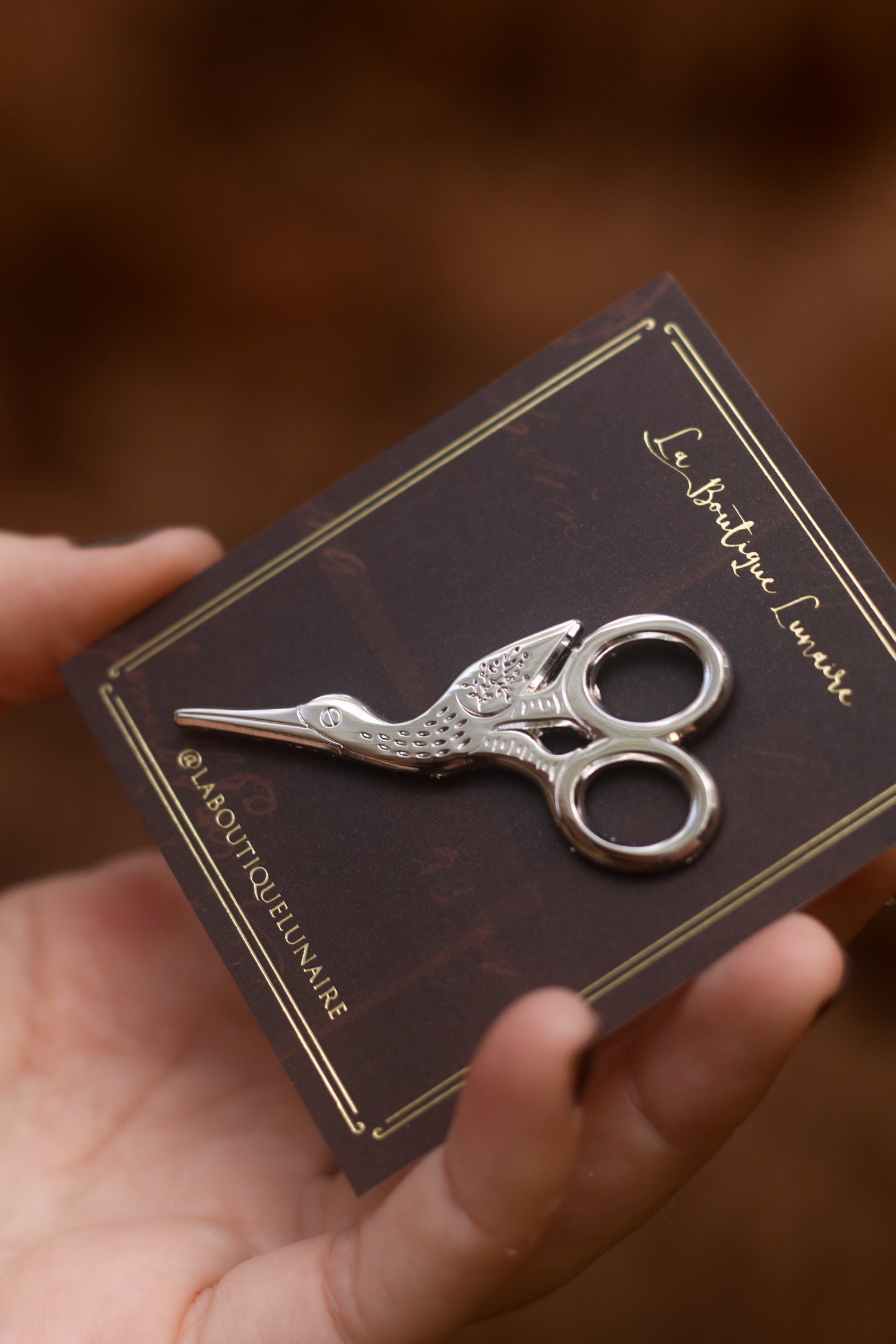Silver stork scissors pin
